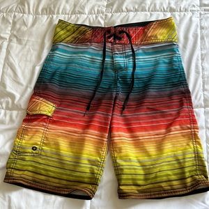 Men’s size 30 swim trunks, bathing suit. Colorful, striped pattern,
